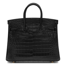Load image into Gallery viewer, Deep Matte Black Block Scaled Compact Structured Trapezoid Tote With Crocodile Grain Luminous Warm Golden Twist Lock Hardware And Hanging Textured Metal Padlock Charm