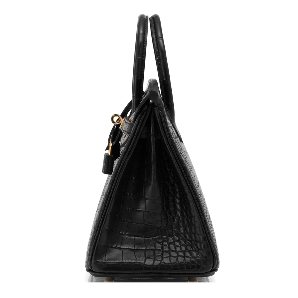 Deep Matte Black Block Scaled Compact Structured Trapezoid Tote With Crocodile Grain Luminous Warm Golden Twist Lock Hardware And Hanging Textured Metal Padlock Charm
