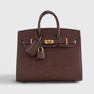 Rich Matte Hazelnut Brown Segmented Scaled Compact Sharp Edged Trapezoid Tote With Polished Warm Golden Twist Lock Hardware And Suspended Textured Metal Padlock Charm Crocodile Grain